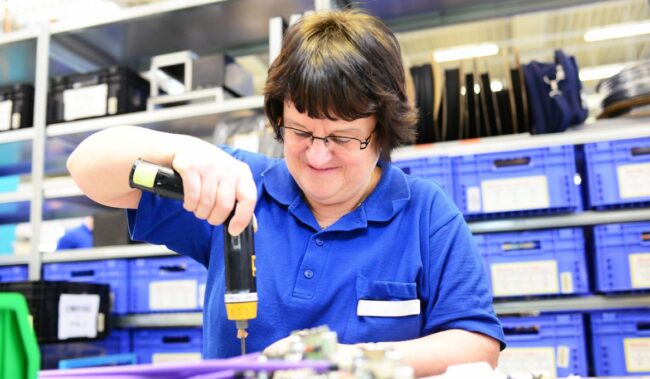 Woman-assembling-electrical-parts-1166×680